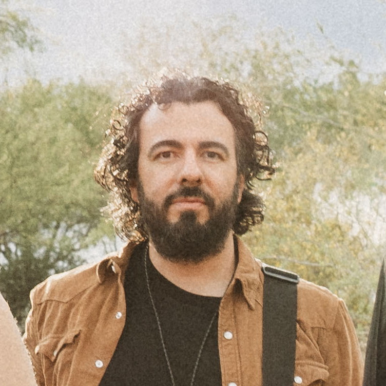 Adam Armijo — electric guitar